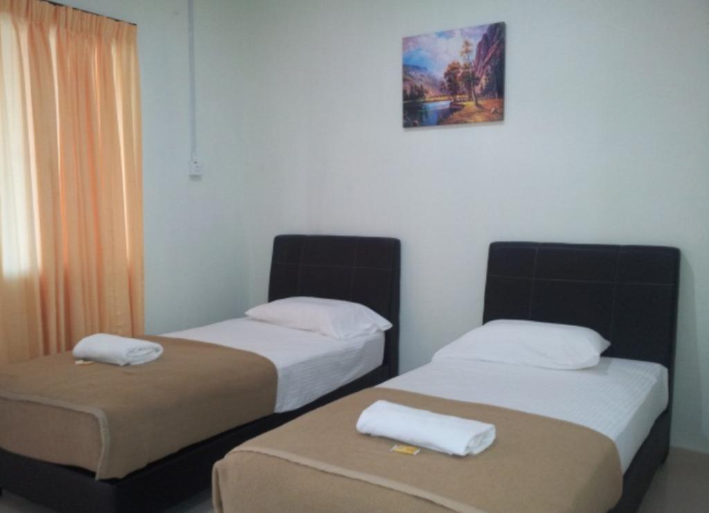 Huda Inn Pantai Cenang  Zimmer foto